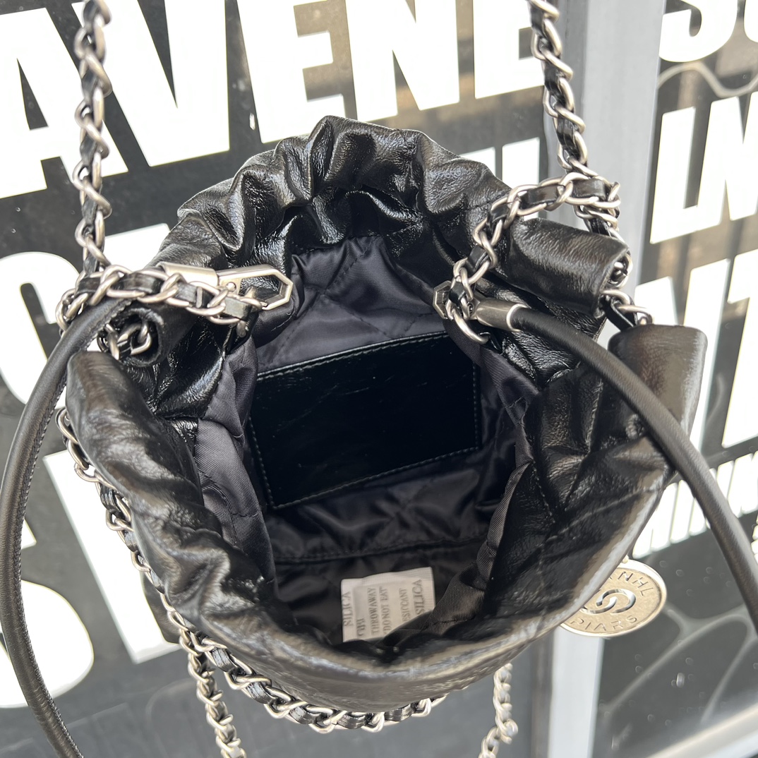 Black Quilted Calf Leather Mini Drawstring Bag